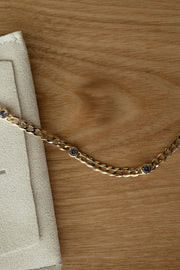 Pulsera cuban con zafiros azules 14k