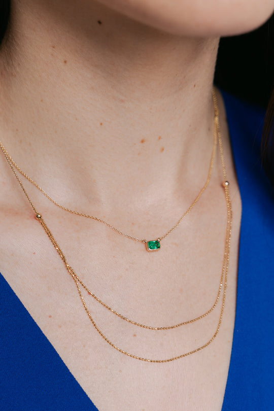 Dije en bisel esmeralda EC 0.5ct 14k