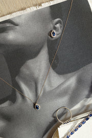 Dije zafiro azul PS 0.5ct con halo de diamantes 14k