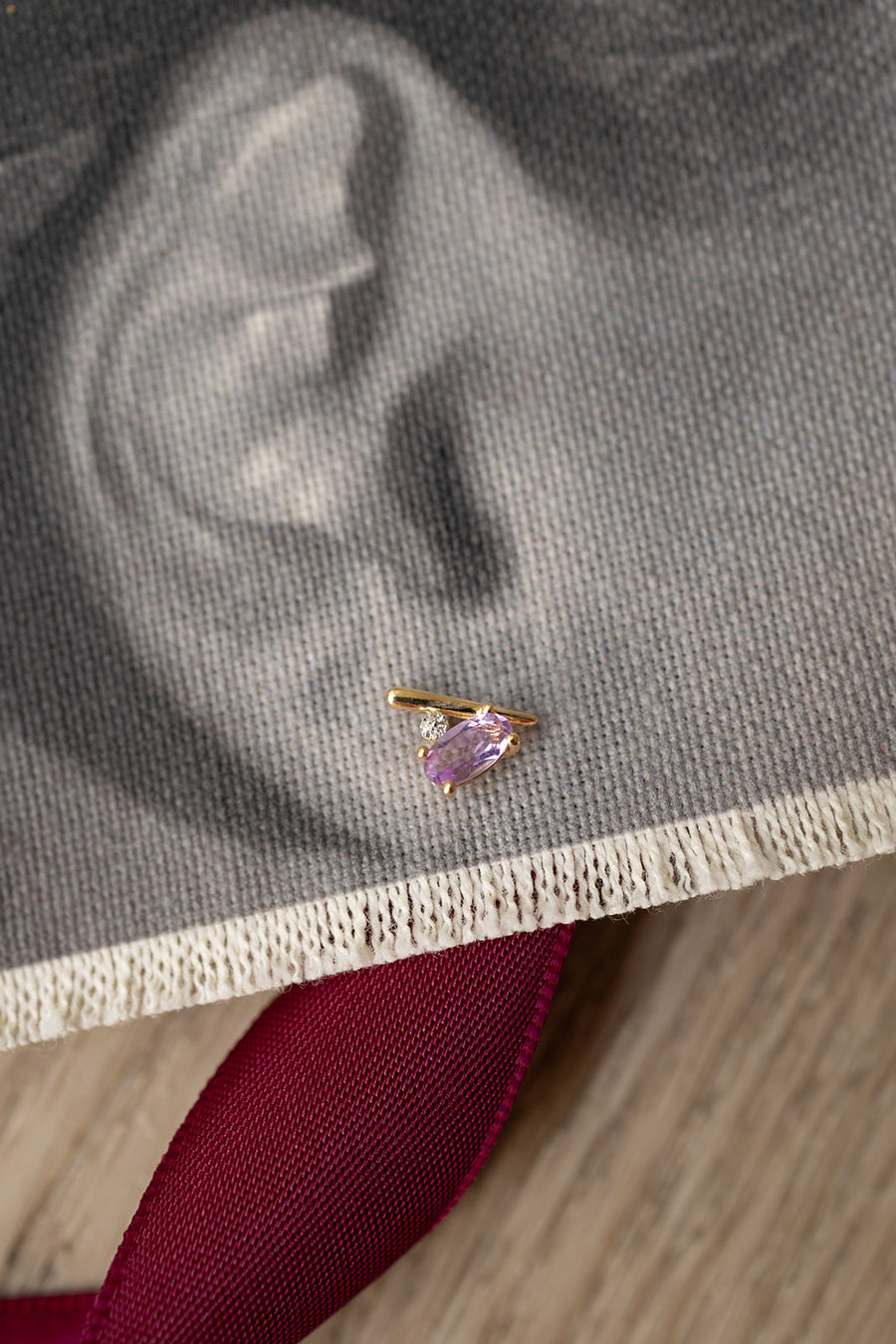 Aretes amatista 0.77ct con diamantes 18k