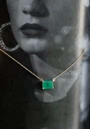 Dije esmeralda EC 0.75ct 4 uñas con cadena 14k