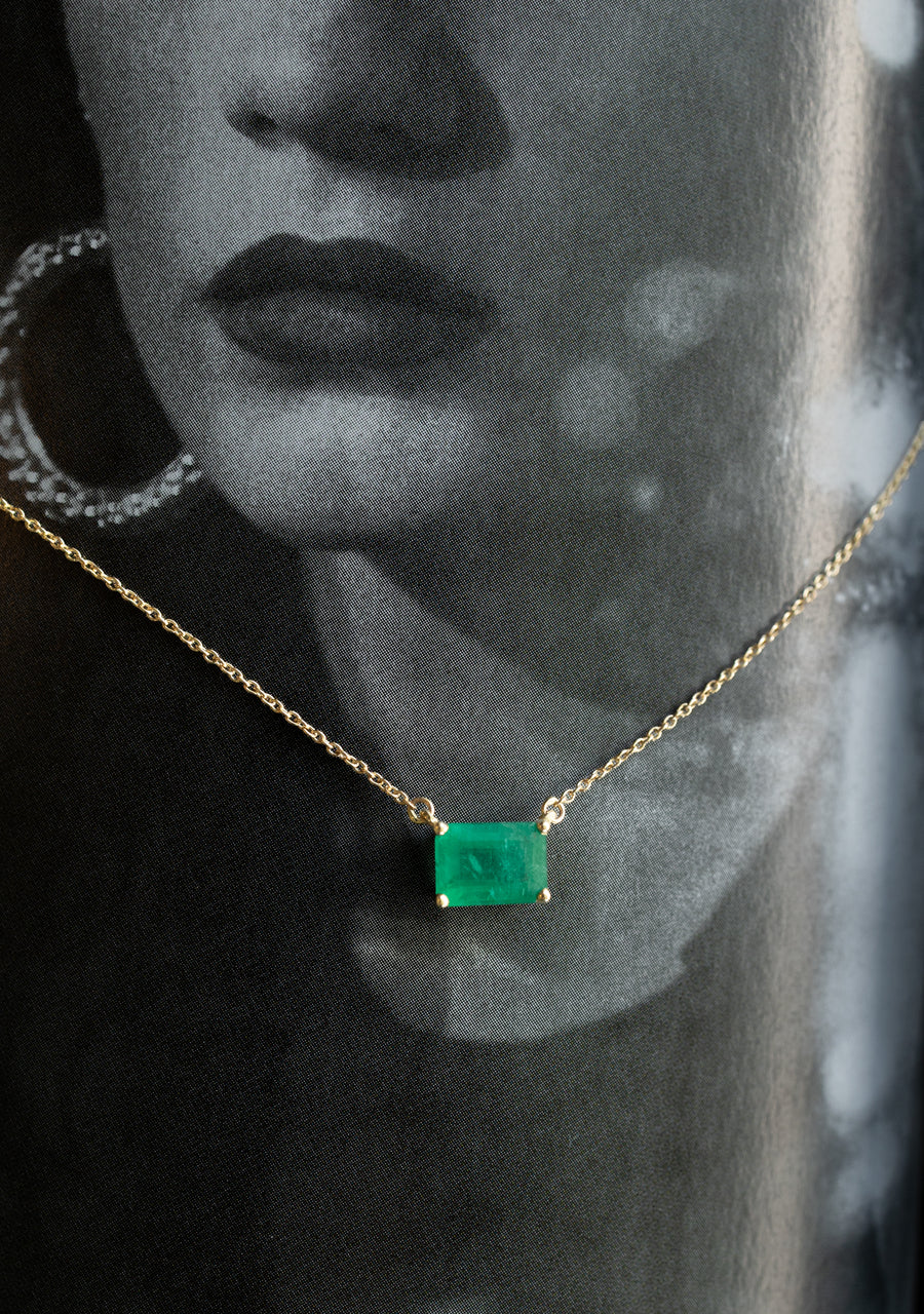 Dije esmeralda EC 0.75ct 4 uñas con cadena 14k
