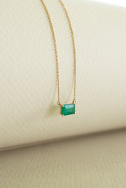 Dije esmeralda EC 0.75ct 4 uñas con cadena 14k