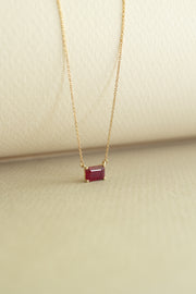 Dije rubí EC 0.75ct 4 uñas 14k
