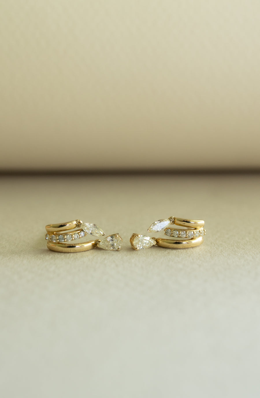 Arracada triple diamantes MQ y PS 0.5ct 14k