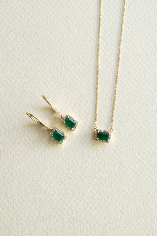 Dije esmeralda EC 0.5ct c/halo en diamantes 14k