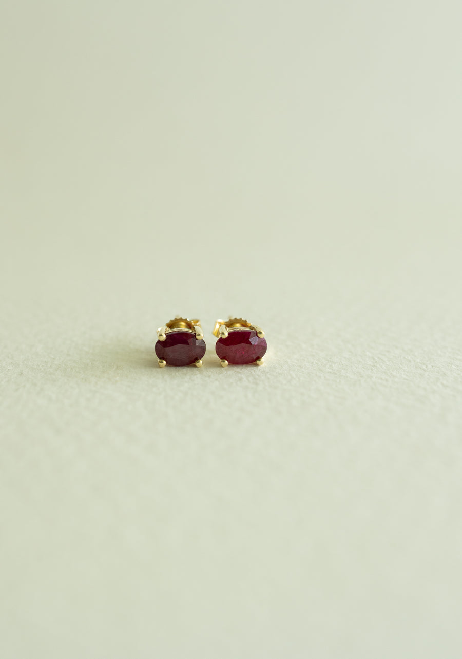 Aretes 4 uñas rubi OV 0.9ct 14k