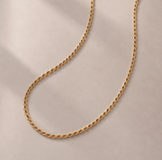 Cadena torsal 60cm 18k