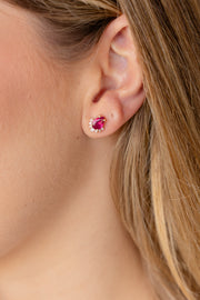 Aretes rubi PS 1.6ct medio halo 1.0 diam 0.1ct 14k