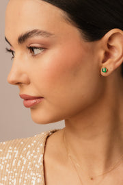 Aretes esmeralda CU 1.6ct total con doble uña 14k