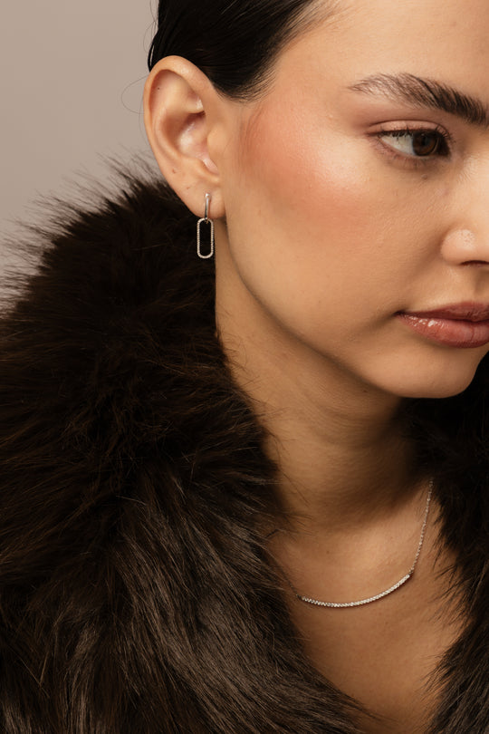 Aretes paperclip quita-pon diamantes 0.14ct 14k en blanco