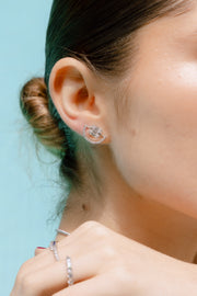 Aretes cluster diamantes con medio circulo 1.1ct 18k