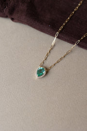 Dije esmeralda PS 1.74ct c/halo diam 0.2ct 14k paperclip