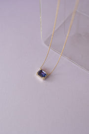 Dije Tanzanita 0.8ct con halo de diamantes 0.15ct 14K