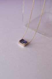 Dije Tanzanita 0.8ct con halo de diamantes 0.15ct 14K