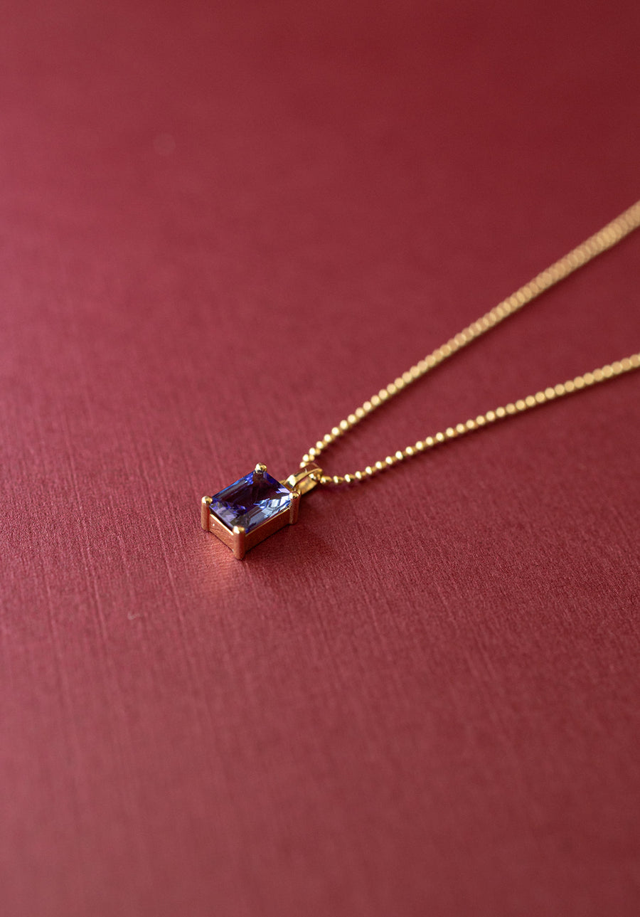 Dije tanzanita EC 0.8ct con cadena de bolitas 14k