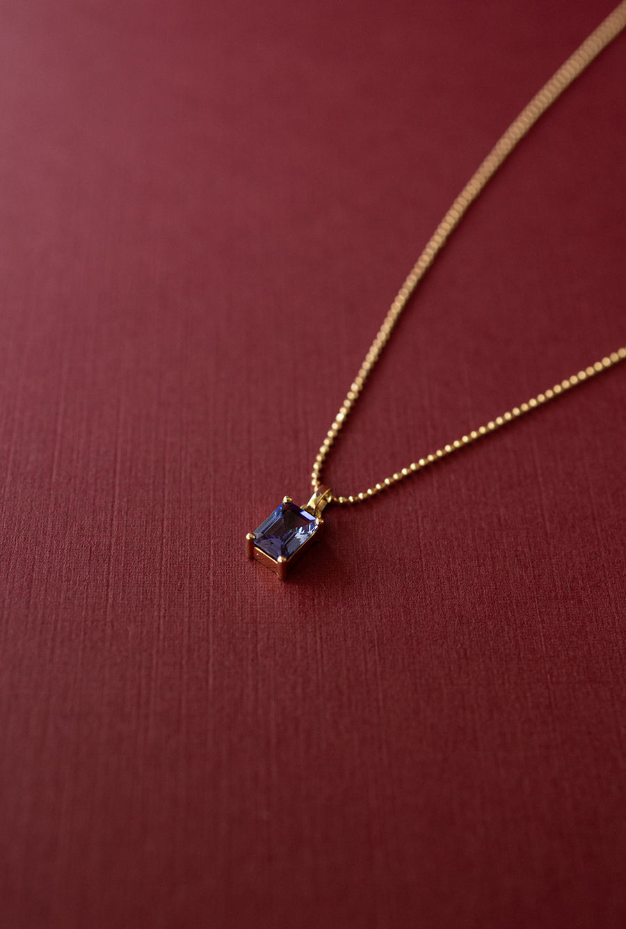 Dije tanzanita EC 0.8ct con cadena de bolitas 14k
