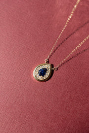 Dije Bisel PS zafiro azul .5ct c/halo de diamantes .12ct bisel 14k