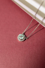 Dije tourmalina Paraiba 0.45ct con halo de diamantes 0.1ct 14k