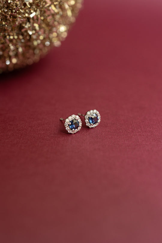 Aretes zafiro azul CU 1.2ct con halo de diamantes 0.3ct 14k