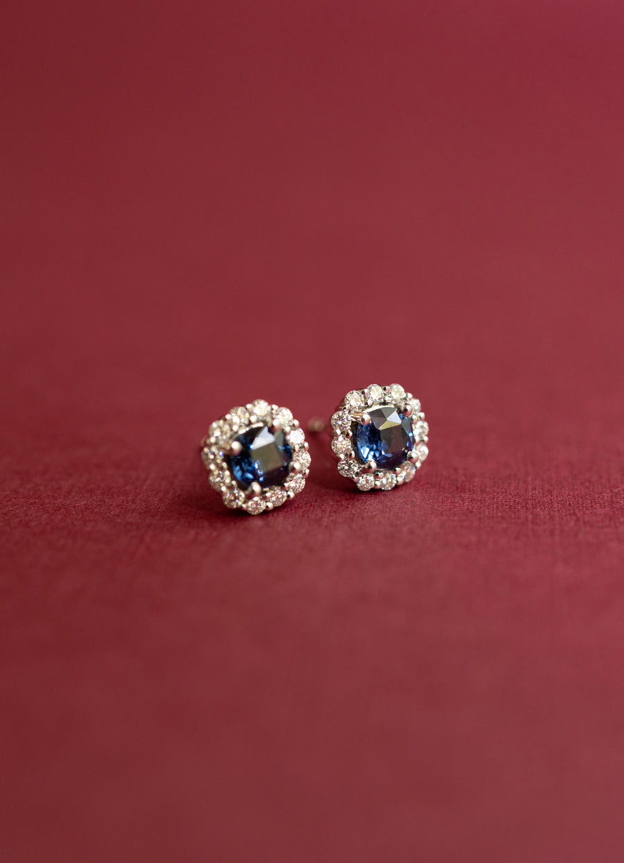 Aretes zafiro azul CU 1.2ct con halo de diamantes 0.3ct 14k